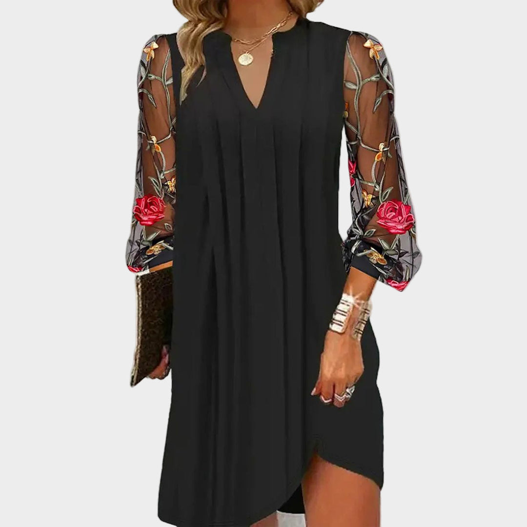 Vestido mini elegante com decote em V e mangas transparentes