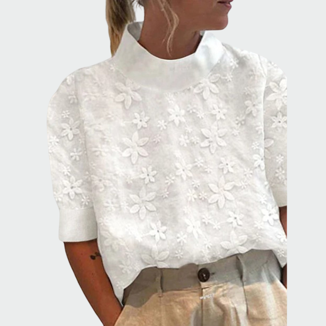 Blusa bordada com gola alta