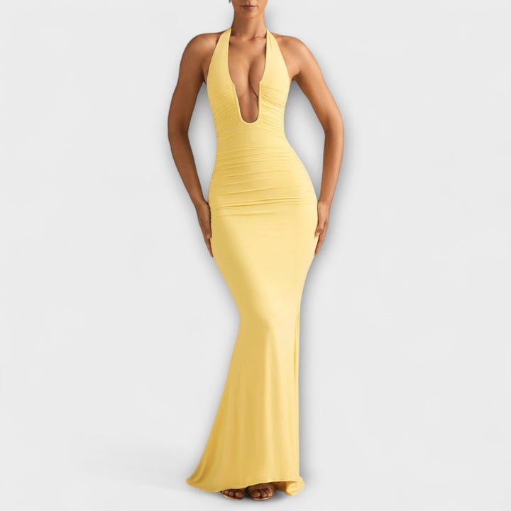 Vestido de gala elegante com costas abertas e decote impressionante