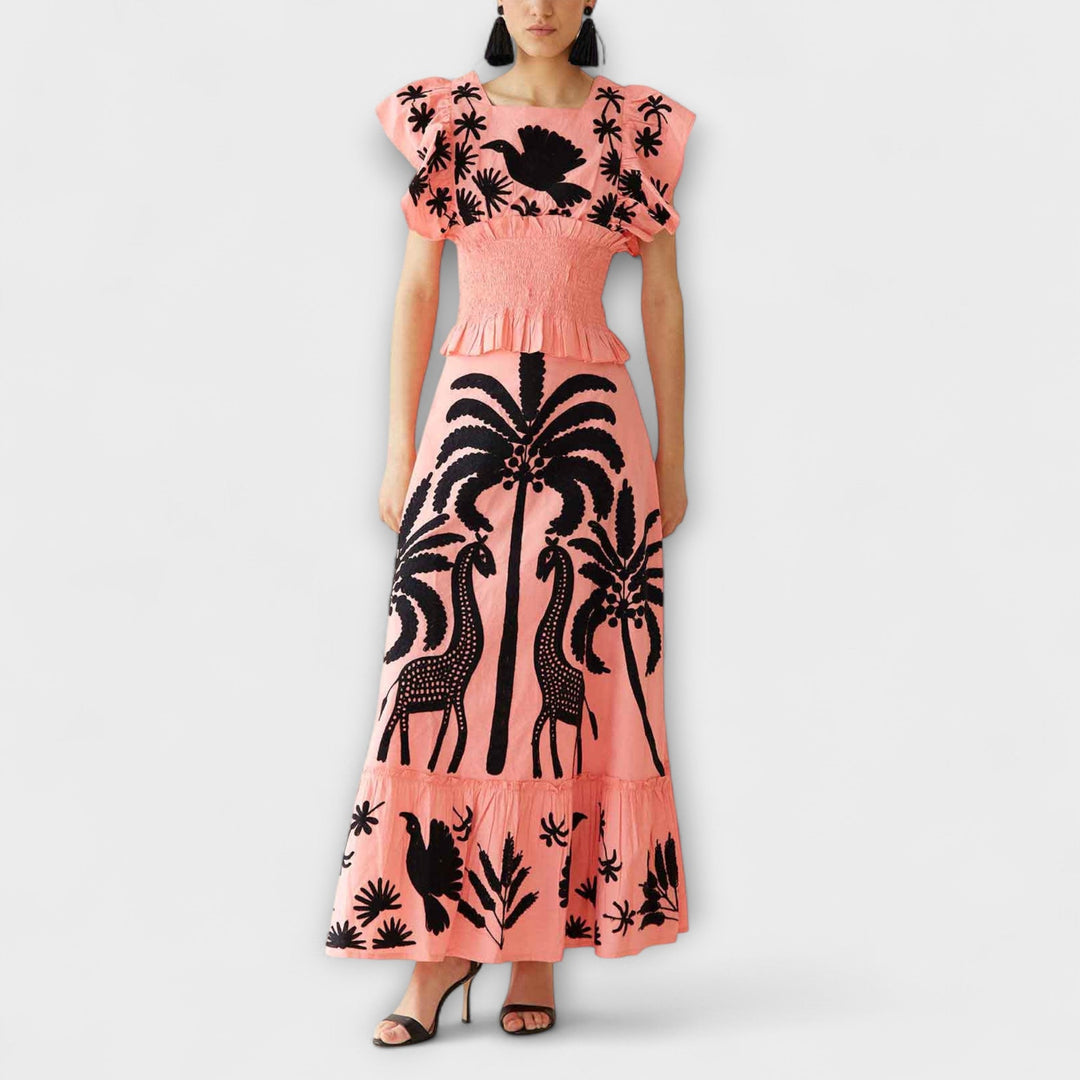Top estiloso com design de palmeira e aves tropicais