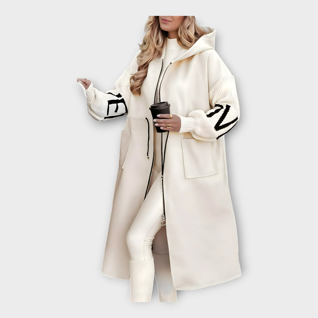 Casaco Longo Elegante com Detalhes Modernos