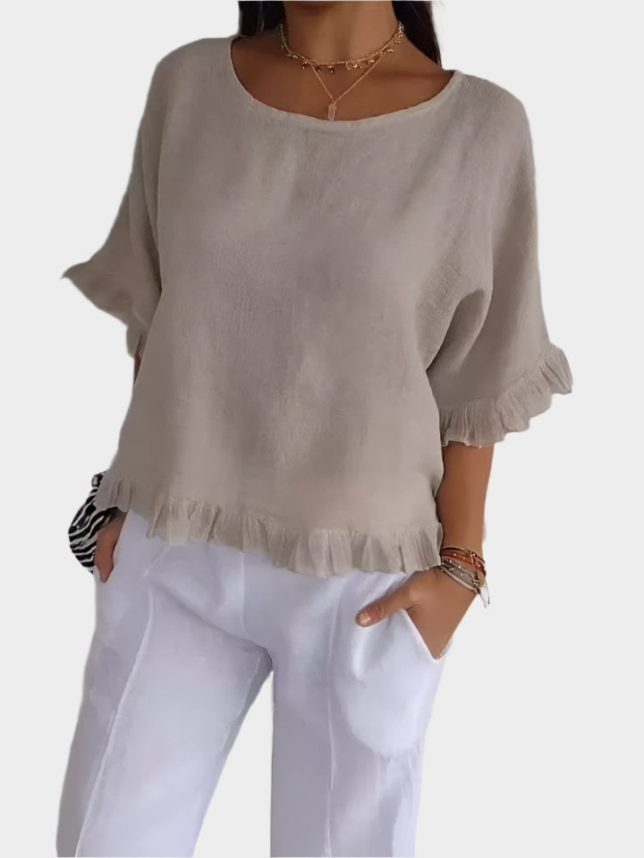 Blusa de Linho Arejada com Costuras e Rendas