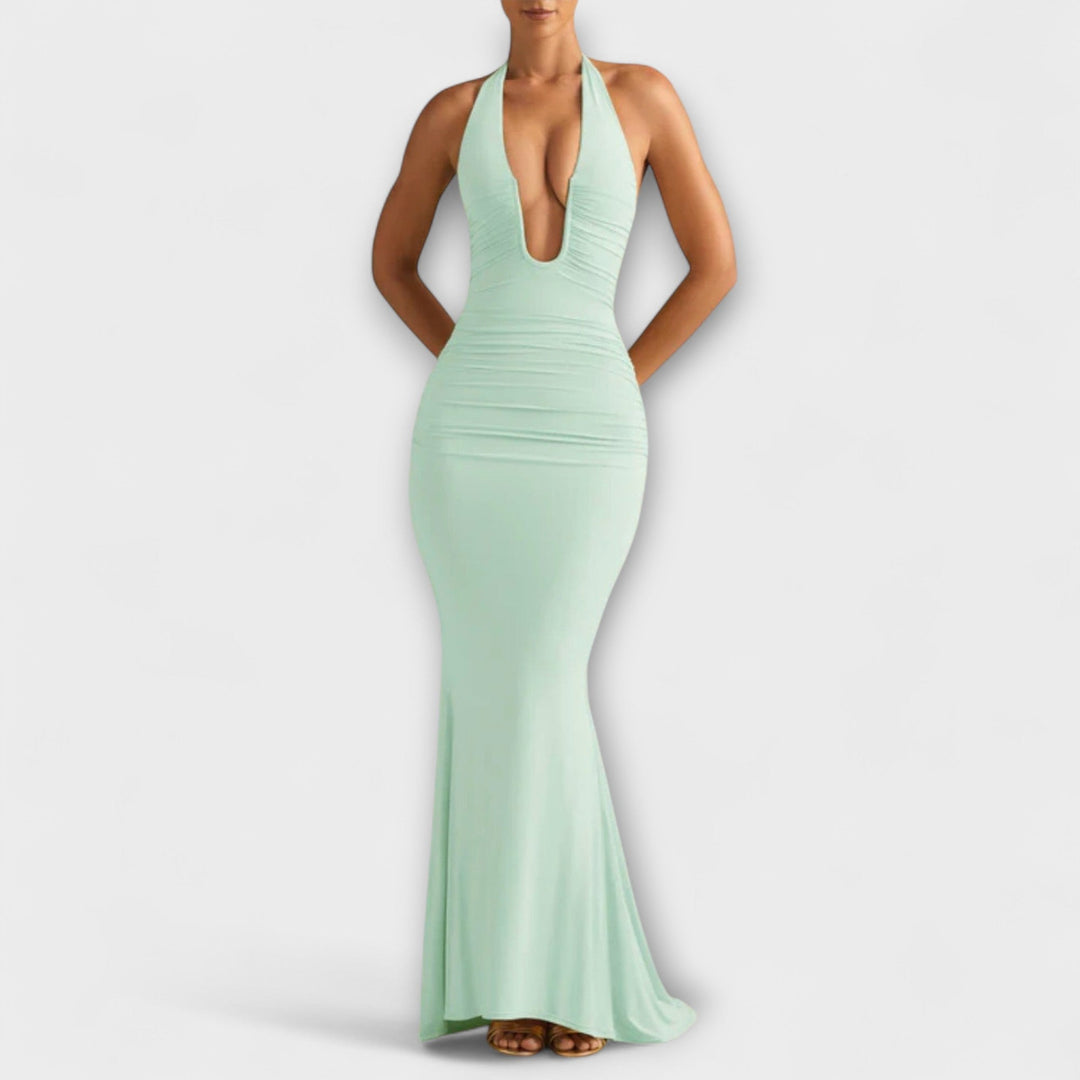 Vestido de gala elegante com costas abertas e decote impressionante
