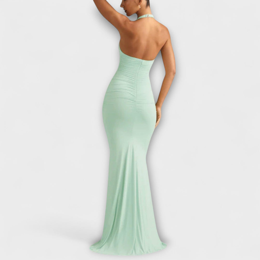 Vestido de gala elegante com costas abertas e decote impressionante