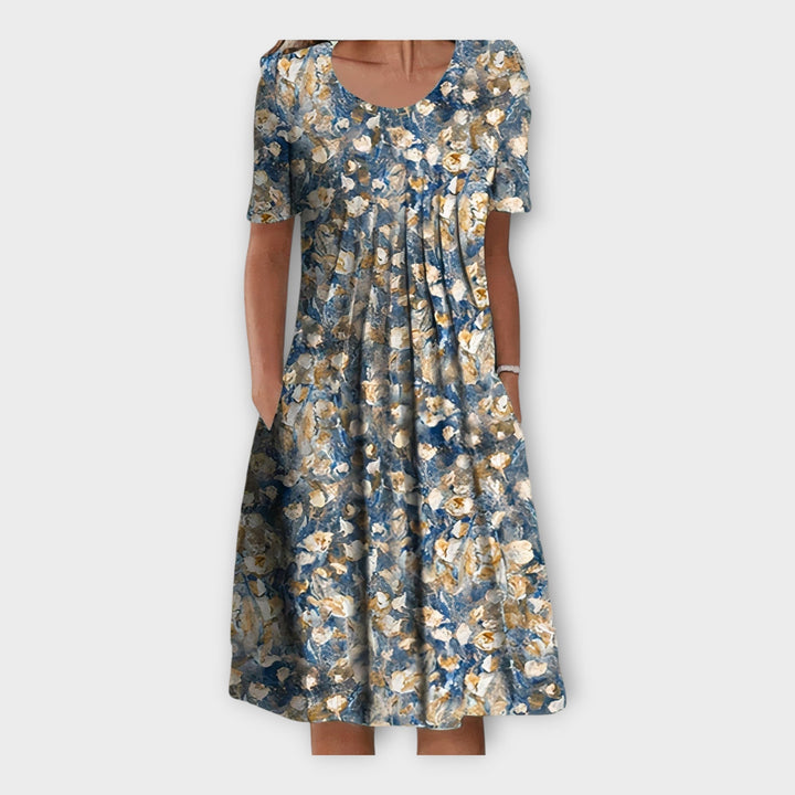 Vestido com Padrão Floral e Manga Curta
