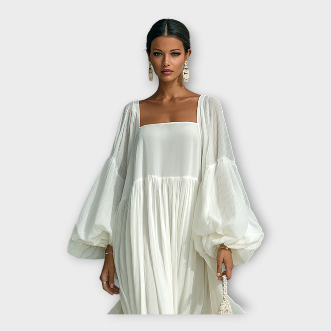 Vestido arejado com estética minimalista refinada