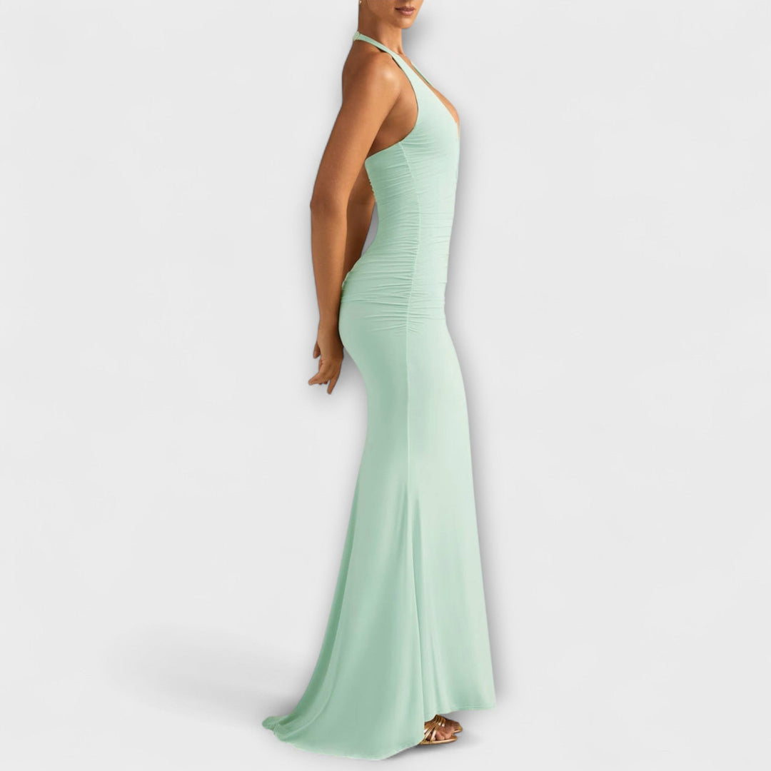 Vestido de gala elegante com costas abertas e decote impressionante