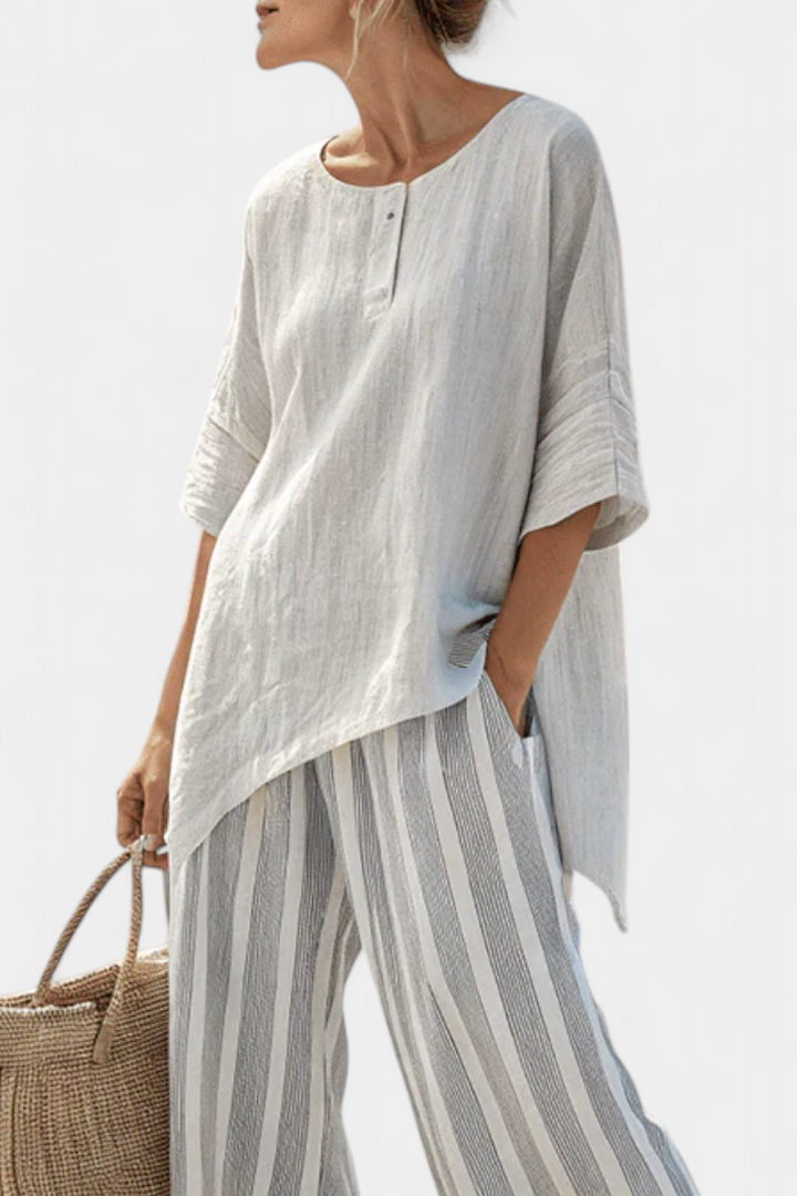 Conjunto Daisy com Blusa Assimétrica e Calças Listradas para um Estilo Moderno e Elegante