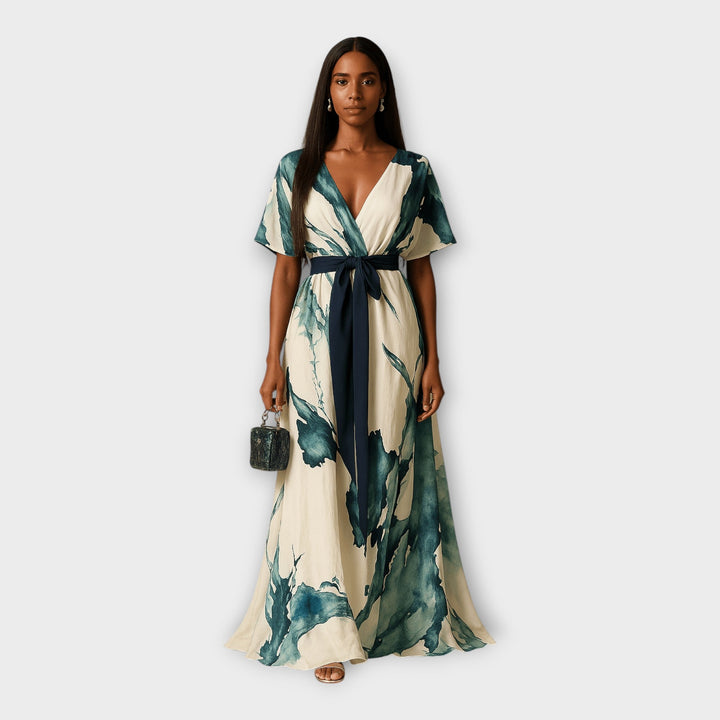 Vestido longo com cinto e linha fluida