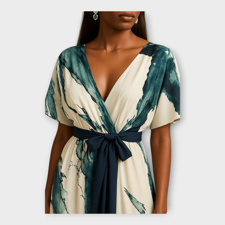 Vestido longo com cinto e linha fluida