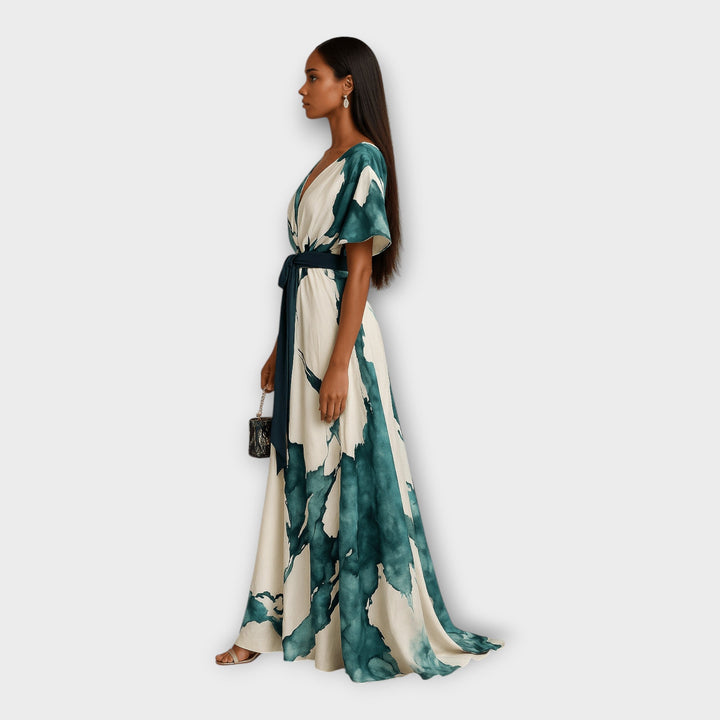 Vestido longo com cinto e linha fluida